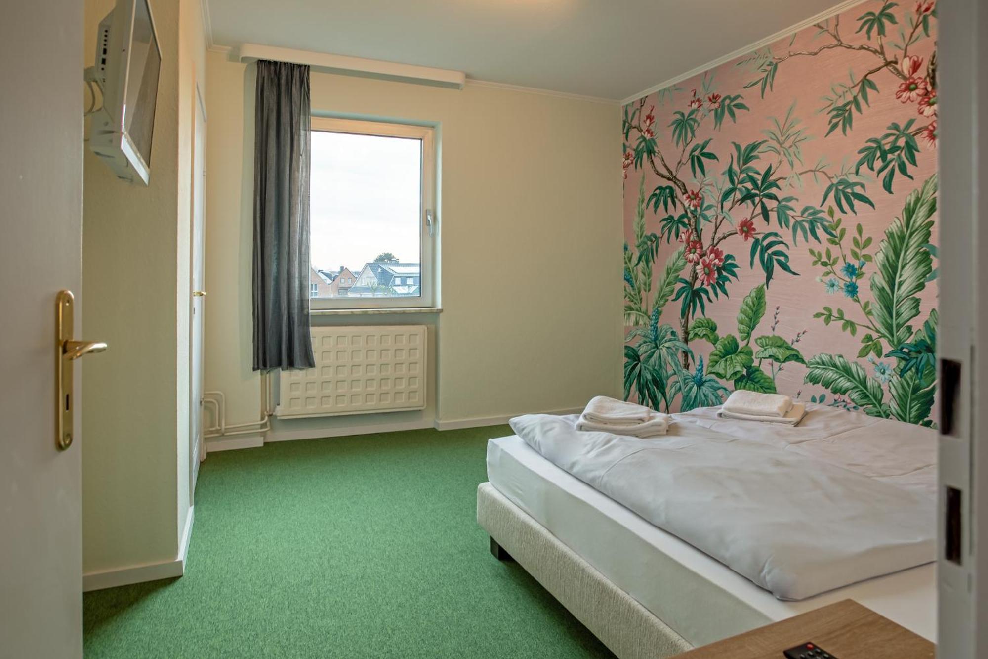 Wannerhus Hotel Grömitz Esterno foto